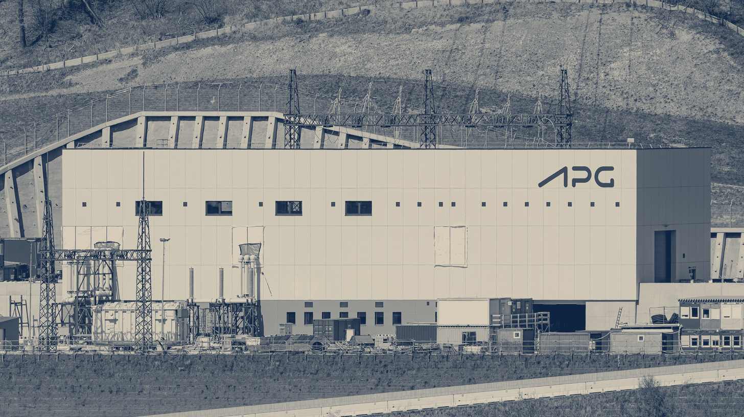 Two-tone photo of an APG high-voltage substation at Leoben, Austria, a stand-in for European critical infrastructure; no counter-drone equipment is shown.