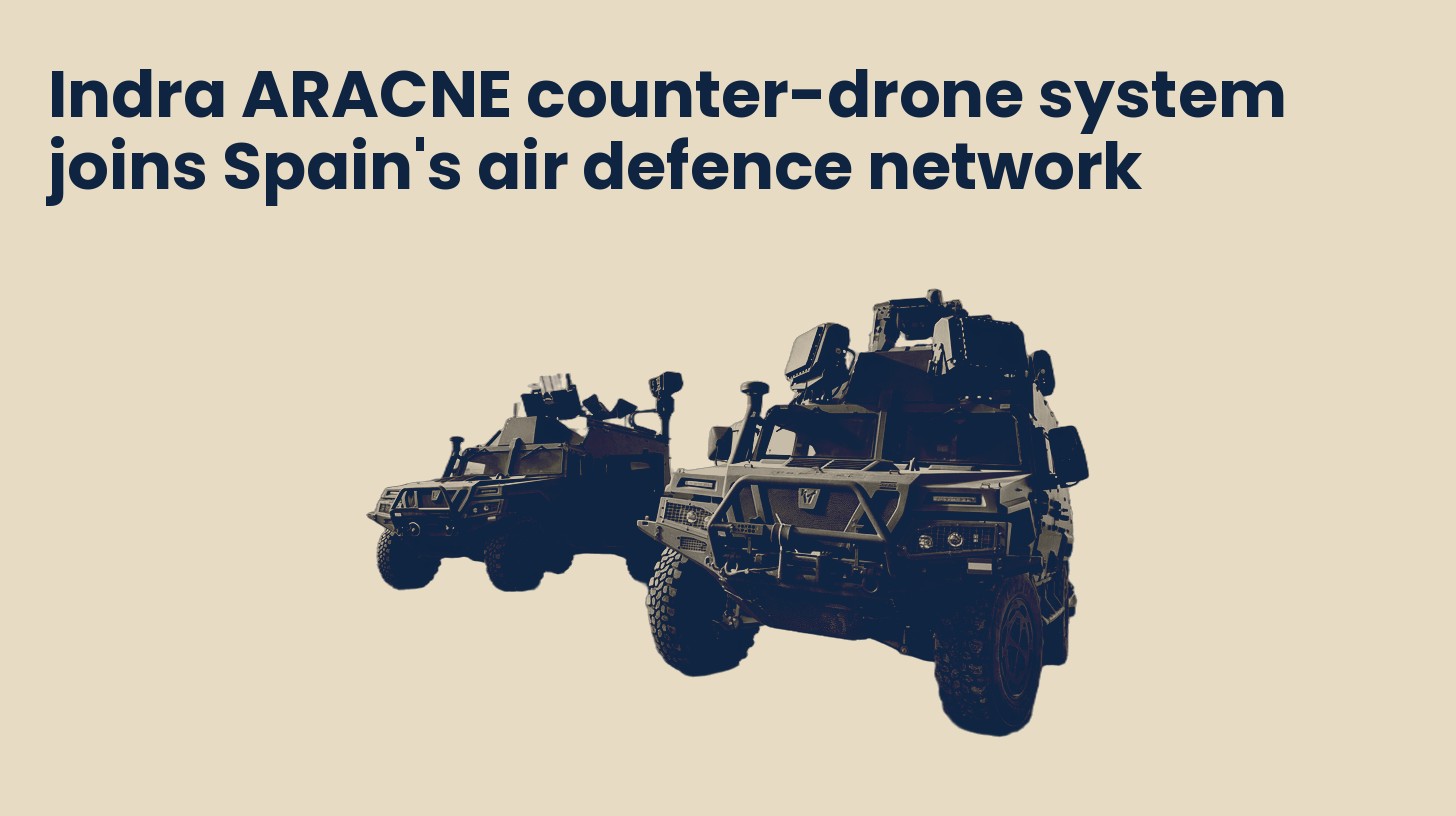 Two armored ARACNE counter-drone vehicles with sensor masts, isolated on a plain sand background.