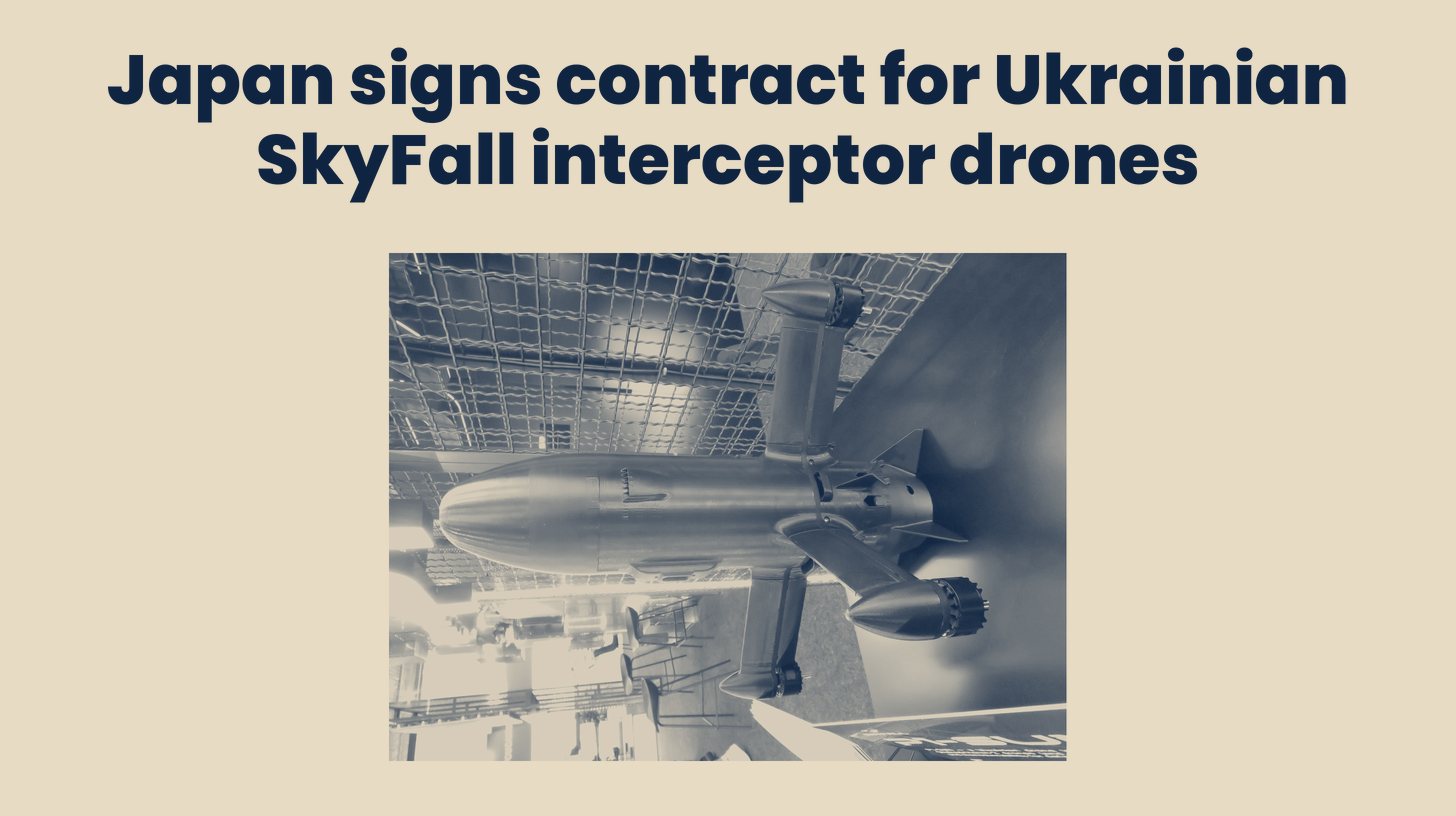 Two-tone photo of a SkyFall P1-SUN interceptor drone on display at the Dubai Airshow in 2025; Japan has not said which SkyFall model it ordered, set below the headline "Japan signs contract for Ukrainian SkyFall interceptor drones."