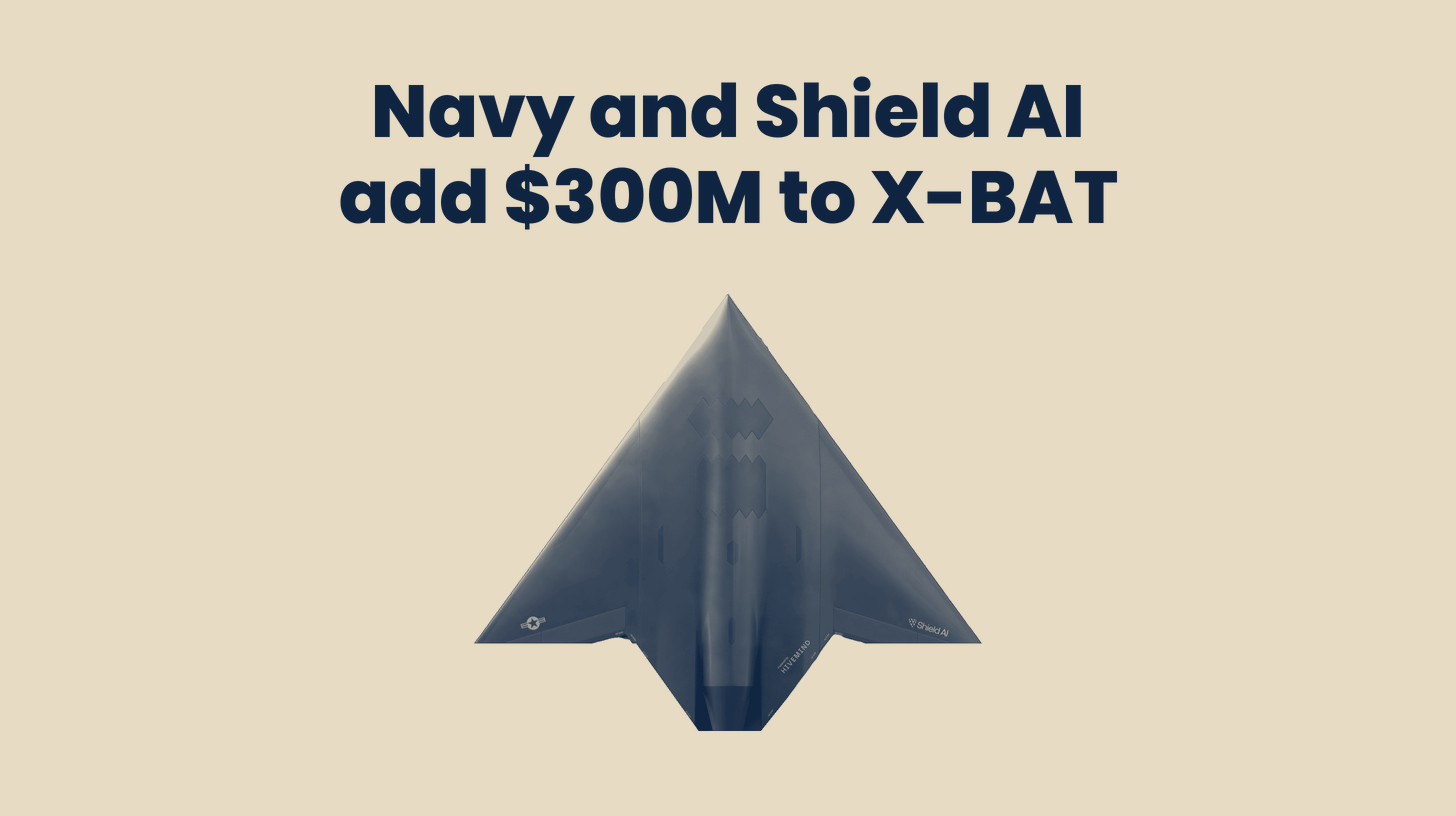 Two-tone Shield AI image of the X-BAT, a tailless delta-shaped airframe shown standing upright on its tail, cut out on a sand background below the headline "Navy and Shield AI add $300M to X-BAT."