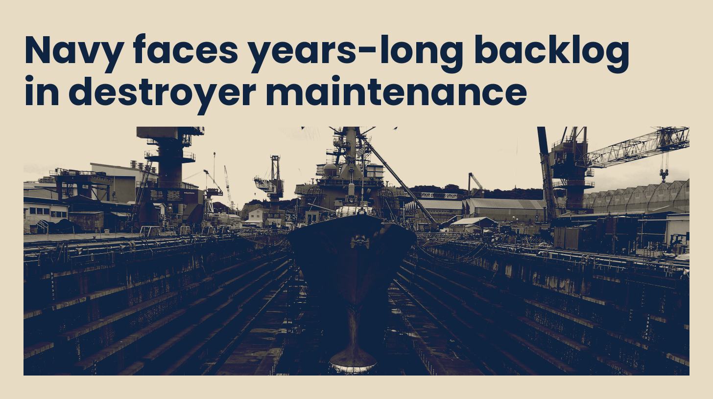 The destroyer USS Stethem sits in dry dock during a maintenance availability at Yokosuka, Japan, in 2011, in navy and sand tones.