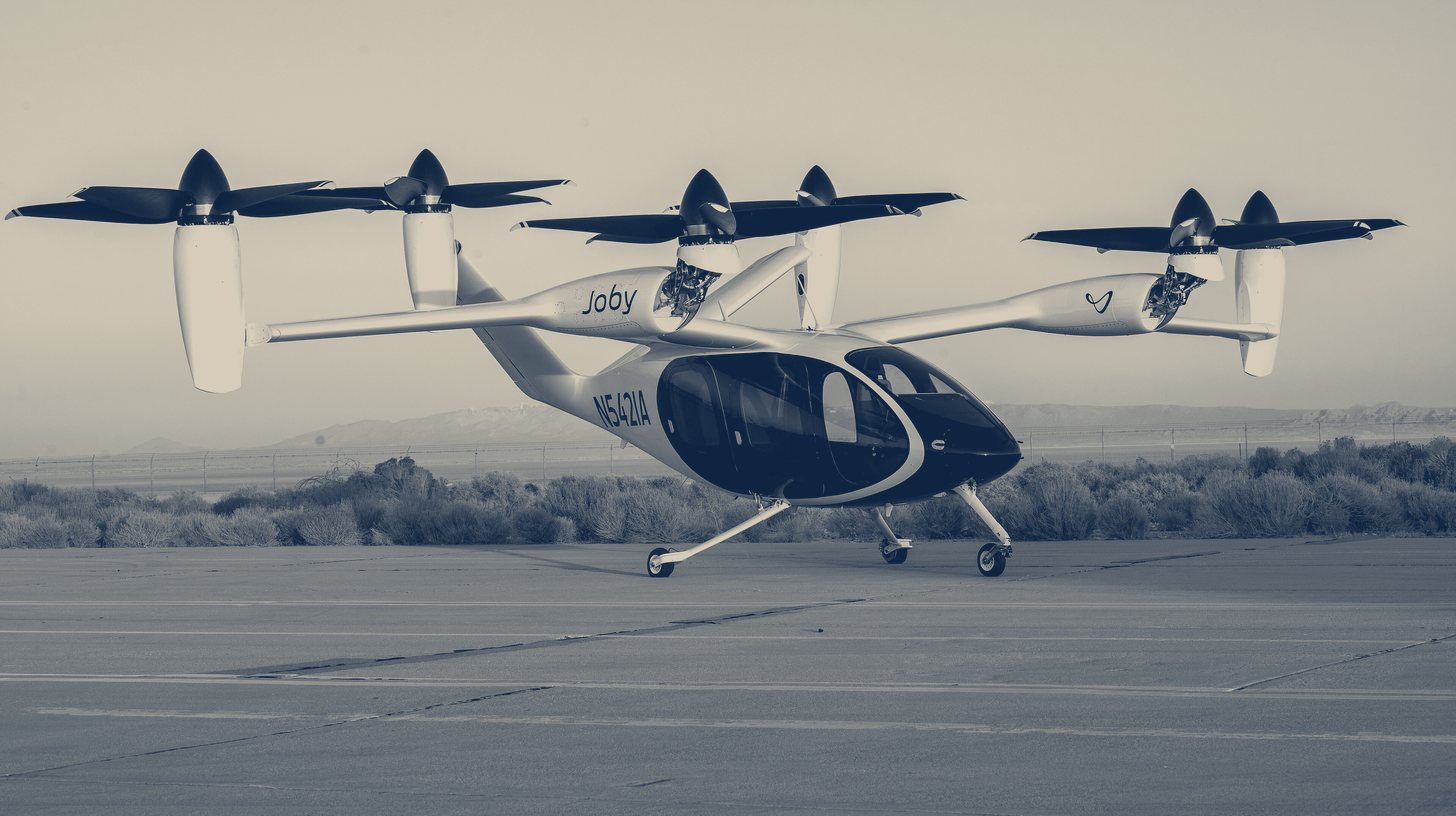 Two-tone U.S. Air Force photo of a Joby Aviation S4 electric vertical take-off and landing aircraft at Edwards Air Force Base, California, September 2023.