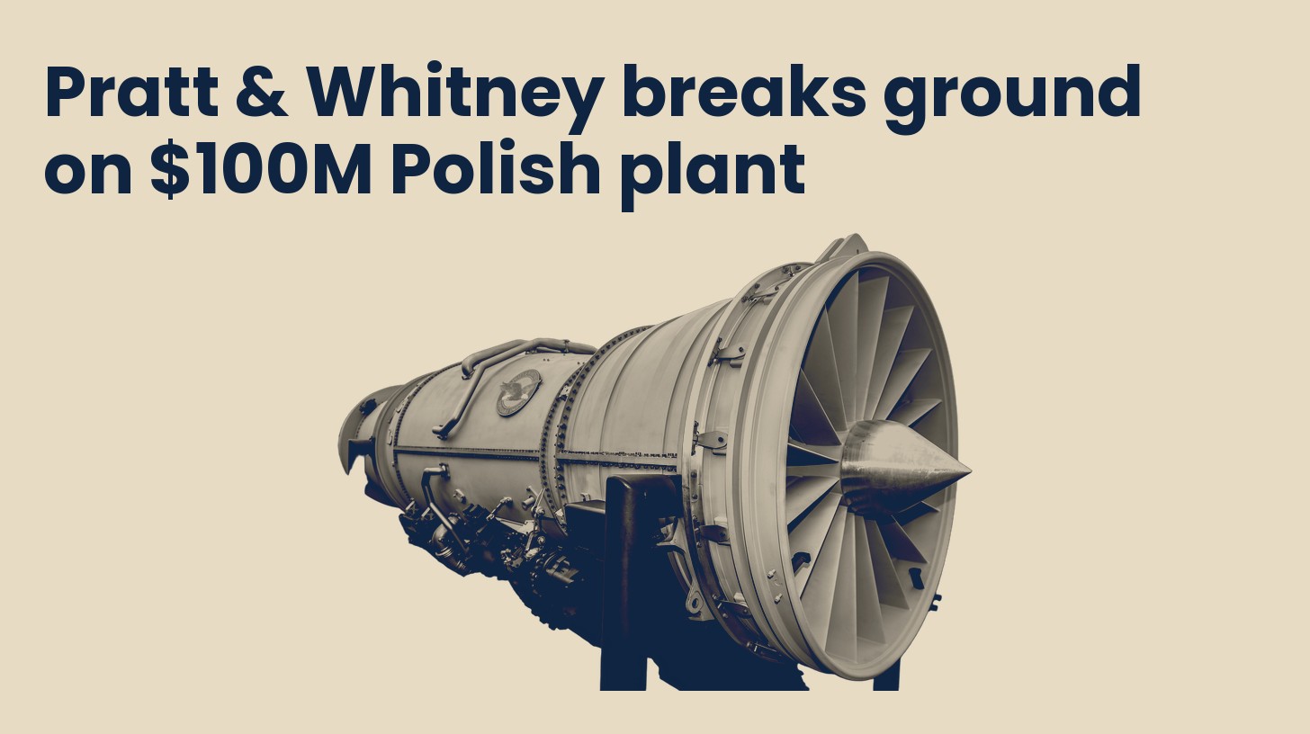 A Pratt & Whitney F135 fighter engine on a display stand, isolated on a plain sand background.