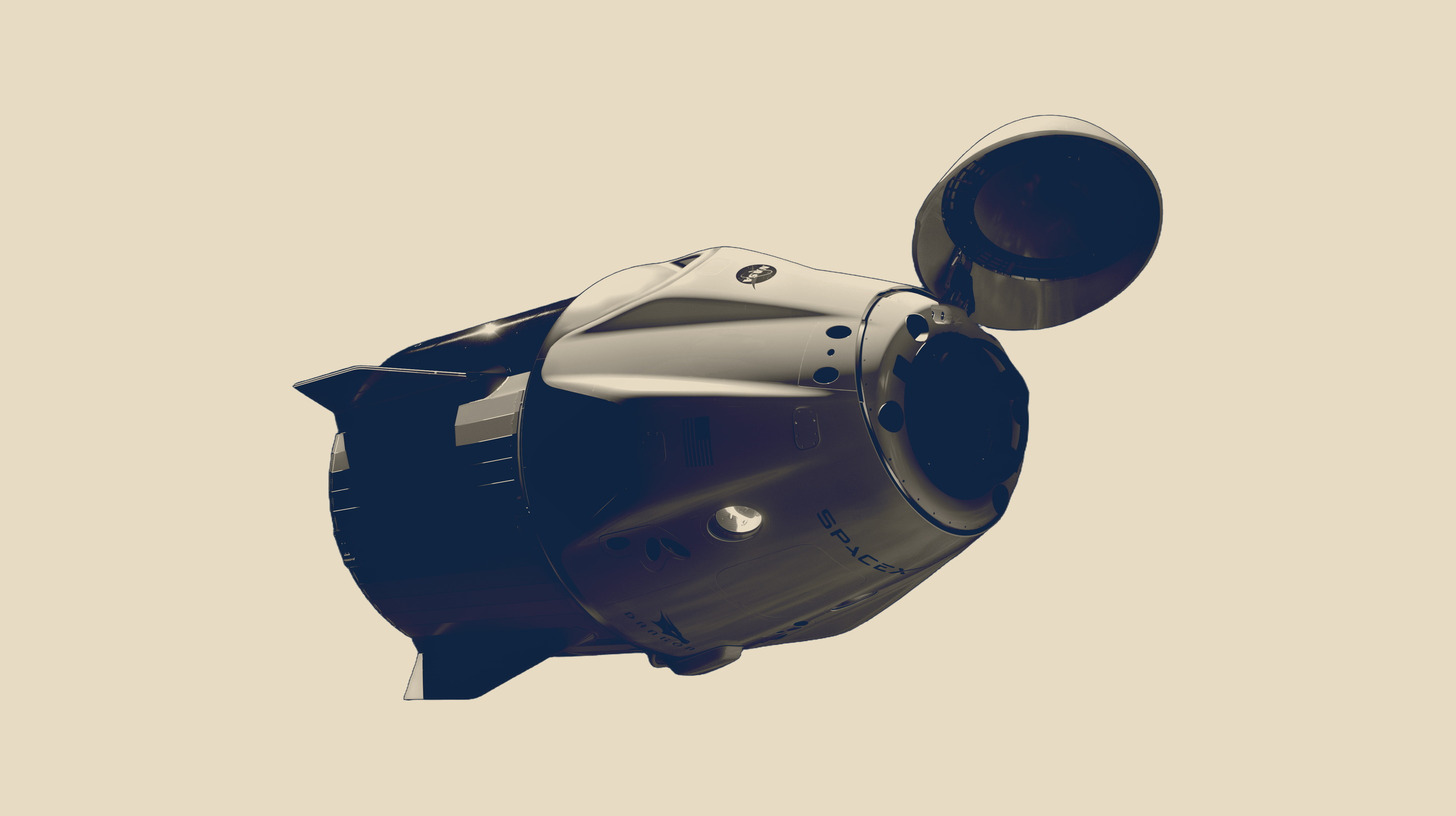 SpaceX Crew Dragon spacecraft near the International Space Station on Sand field