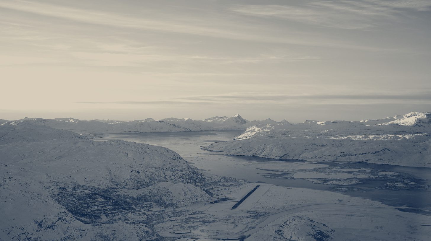 Two-tone photo of Narsarsuaq Airport runway and fjord in southern Greenland, one of the sites in the planned expansion.